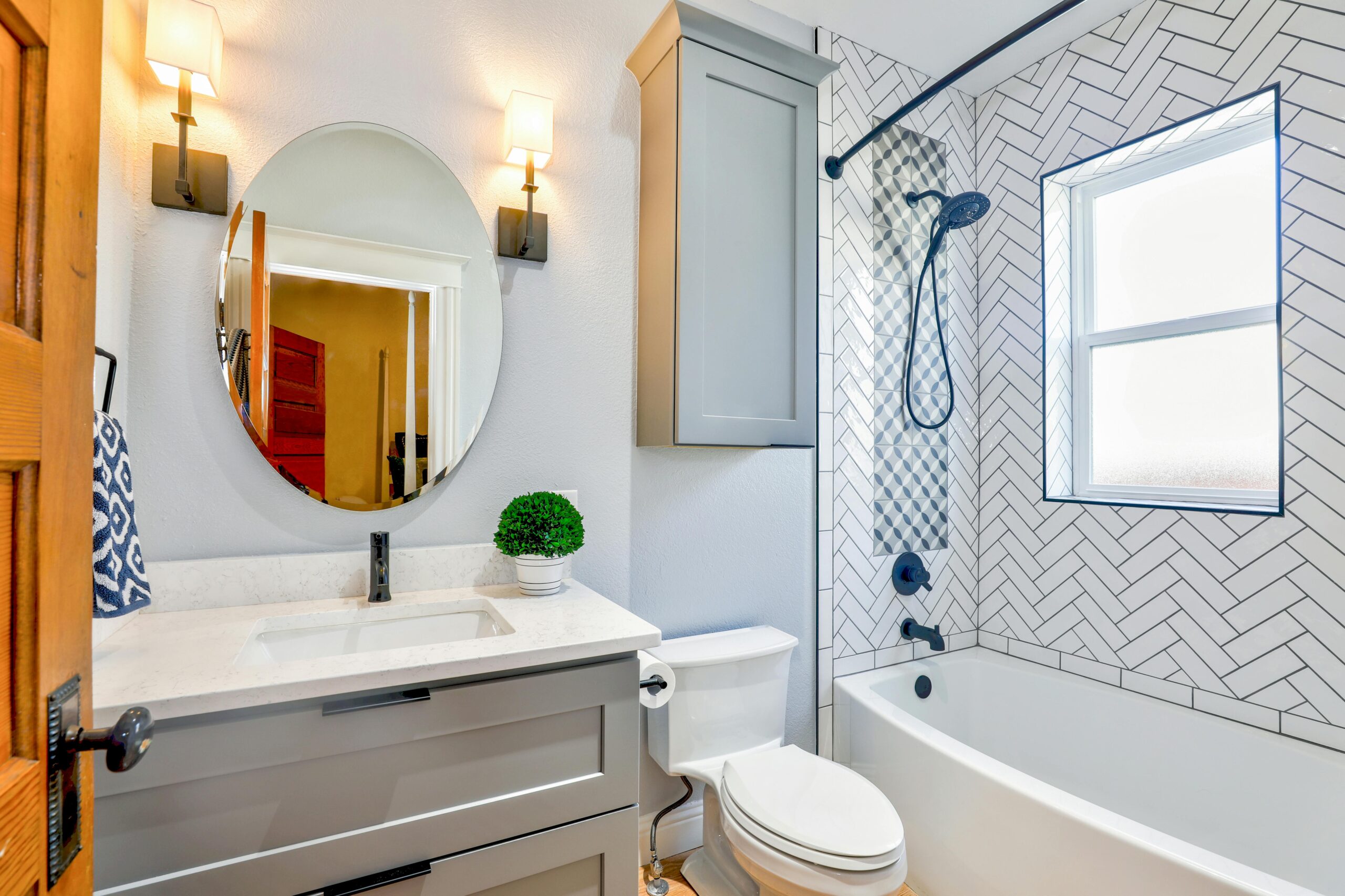 Modern fixture and plumbing renovations in an upscaled bathroom.